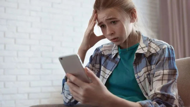 Teenage girl representing the need for a smartphone ban for under 16s