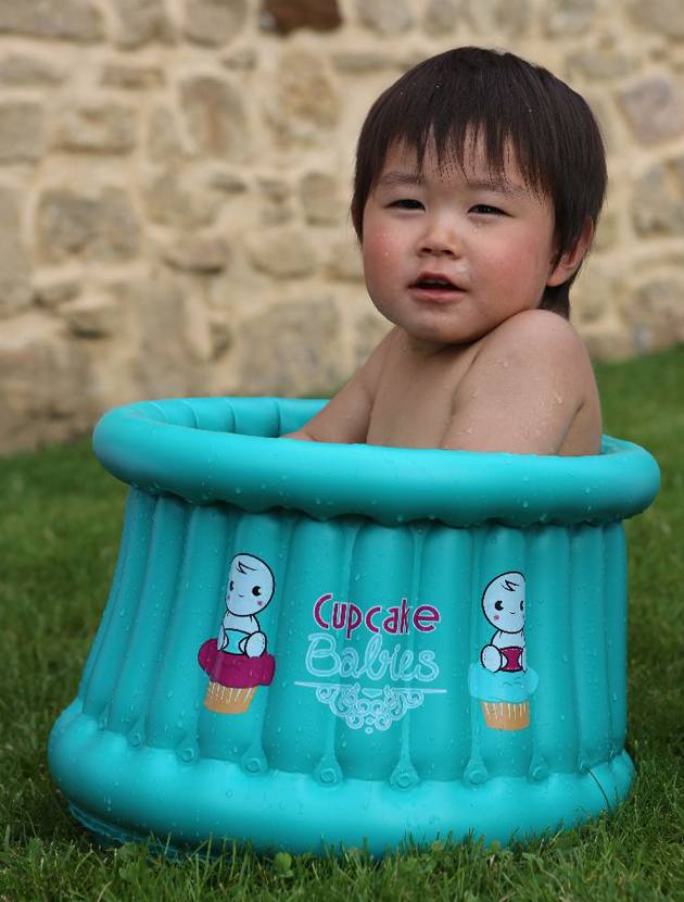 Little Boy In Cupcake Inflatable Bath