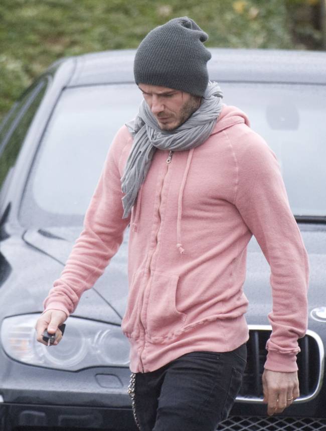 Becks rocks a pink hoodie | Image:  Photographer Gavin Rodgers / REX