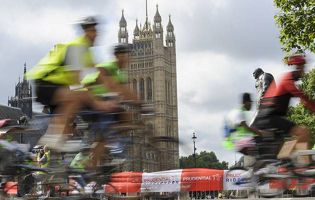 Wheelie good view: Those taking part in the gruelling London-Surrey 100 zip past the iconic clock formerly known as Big Ben | Image: Prudential RideLondon